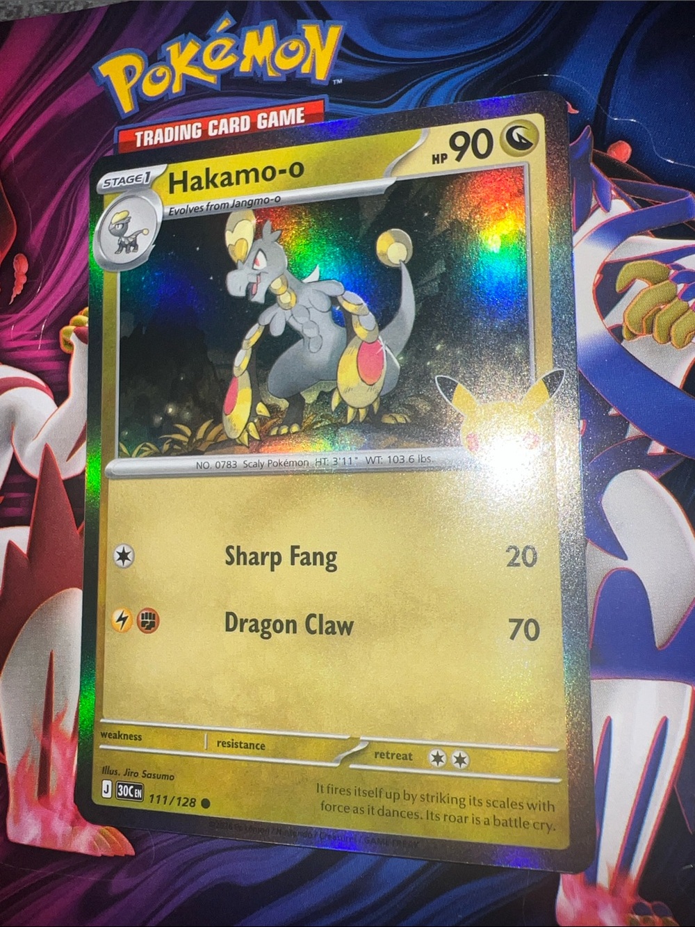 Pokemon Hakamo-o Holographic Card - Yellow, Gold